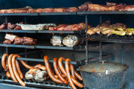 Meat, beef, pork and chicken at street restaurant night marketの写真素材