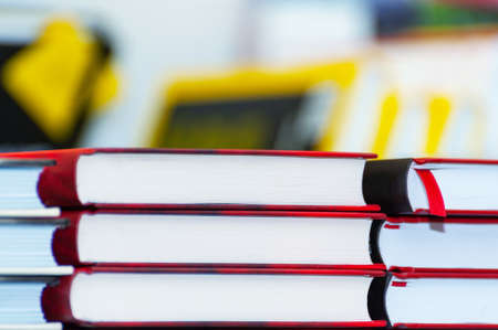 Stack of new books on the table. Books on the forum of manufacturers of printed products.の写真素材