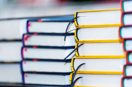 Stack of new books on the table. Books on the forum of manufacturers of printed products.の写真素材