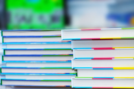 Stack of new books on the table. Books on the forum of manufacturers of printed products.の写真素材