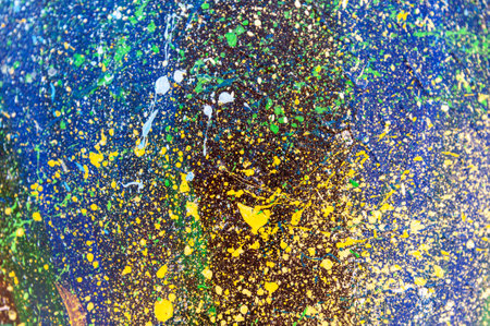 Art paint background of bright multi colored and textured painted surfaceの写真素材
