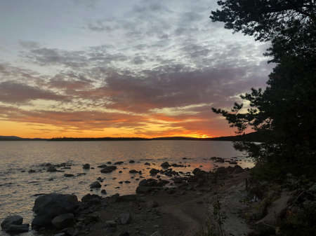 beautiful sunset in the North of Russia outside the city on the lakeの写真素材