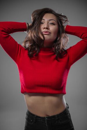asian girl fooling around on cameraの写真素材
