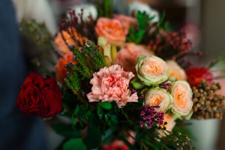 Beautiful bouquet of colorful rose buds close-up.の写真素材