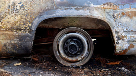 This is a photo of a truck tire rim. All that remains from the Holiday Farm forest fire.の写真素材