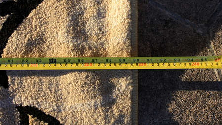 Measuring 90 inches at sunset.の写真素材