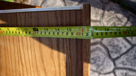This is the measuring of 16 and about 3/4rs inches long.の写真素材