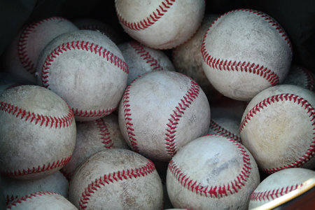 Baseball balls in a box, close-up of a baseballの写真素材