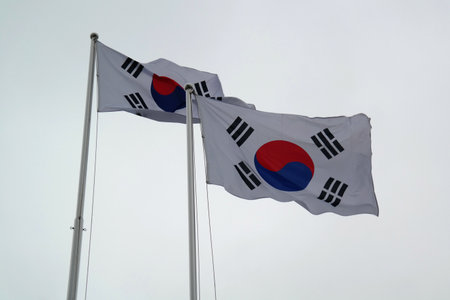 Two flags of South Korea are blowing in the wind