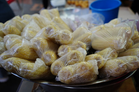 Steamed corn on the cob for sale at a Korean marketの写真素材