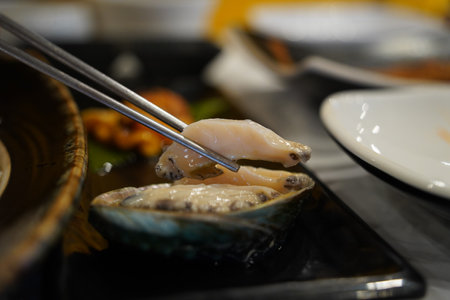 Eat fresh abalone sliced âââârawの写真素材