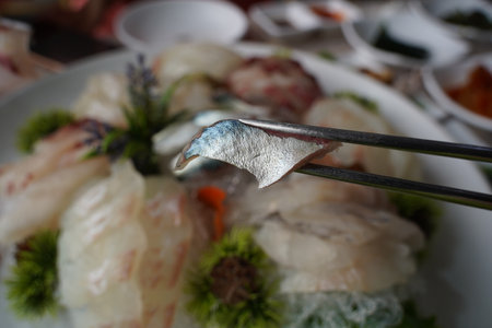 Fresh mackerel sashimi with a silvery sheenの写真素材