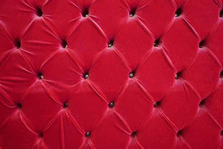 Close up of Luxury red velvet textured furniture surfaceの写真素材