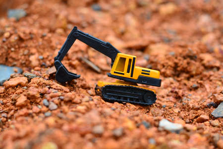 Excavator Toy work at construction site.の写真素材