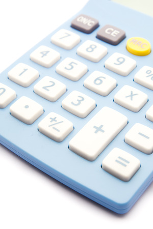 Blue calculator on white backgroundの写真素材