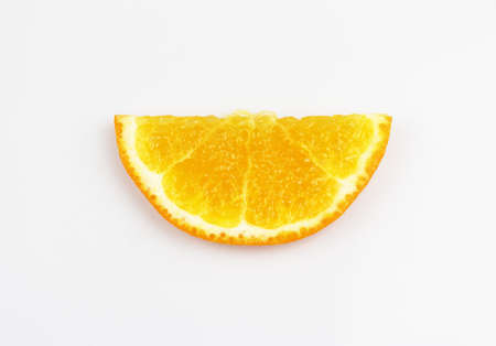 Orange slices with separate hemispheres from a white background.の写真素材