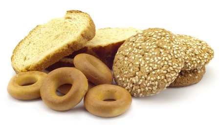 dried bagels and carrots on a white background