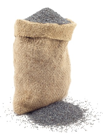 poppy seeds in the bag on a white backgroundの写真素材