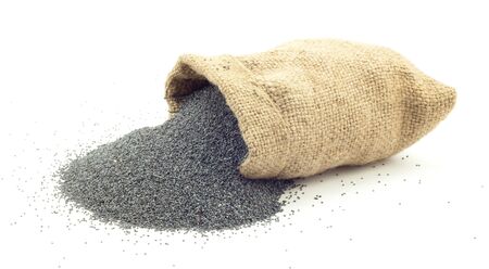 poppy seeds in the bag on a white backgroundの写真素材