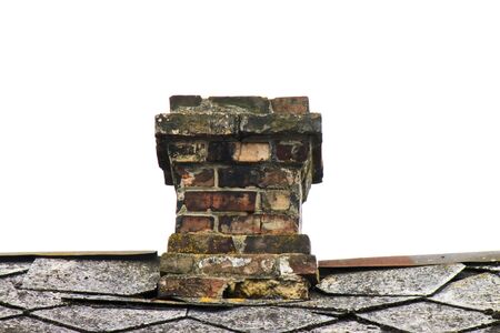 old chimney with a tile on a white backgroundの写真素材
