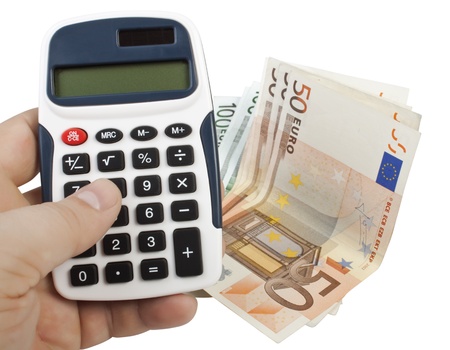 Calculator with Euro bank notes isolated on white backgroundの写真素材
