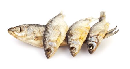 dried fishes isolated on white background の写真素材