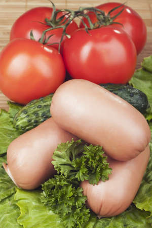 Sausage with herbs and vegetablesの写真素材