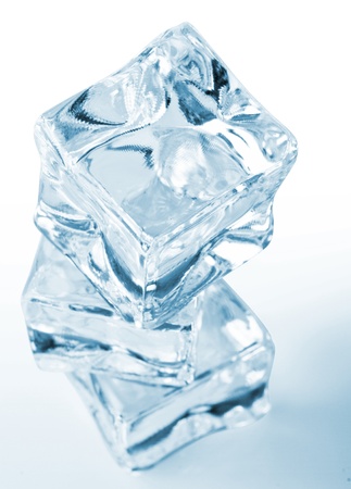 Three ice cubes on white background. の写真素材