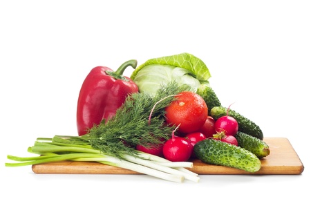 fresh vegetables on the board, on a white backgroundの写真素材