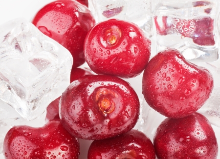 Ice Cherries. Fresh cherries with ice cube の写真素材