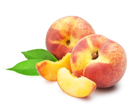 Ripe peach fruit with leaves and slises on white backgroundの写真素材