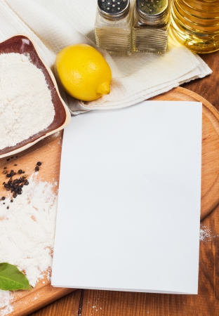 spices on the wooden background and paper for notes の写真素材