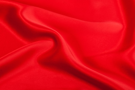 Smooth elegant red silk can use as background の写真素材