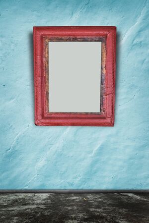 Old room with empty picture frame 
