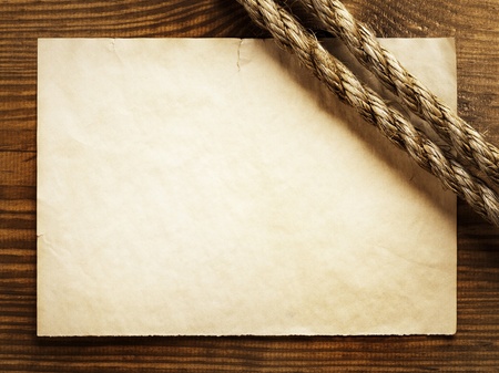 aged Rope on the old paper background の写真素材