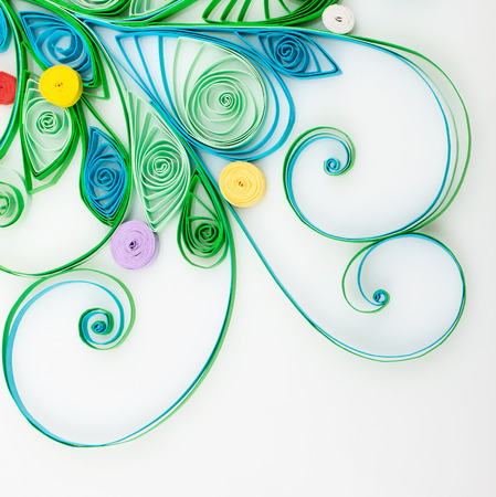 Quilling. Made of strips of paper snowflake on a white background の写真素材