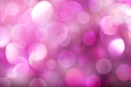 Defocused Vintage pink shiny lights Christmas Bokeh background.の写真素材