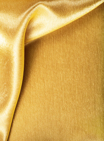 Golden Fabric silk texture for backgroundの写真素材