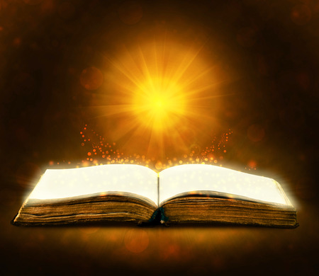 Old book with magic Ray of light の写真素材