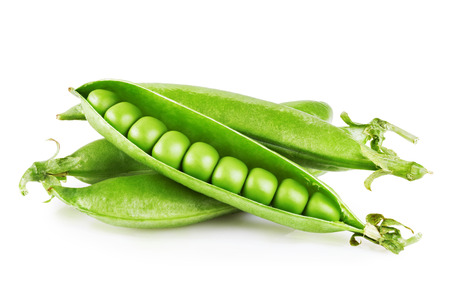Fresh green peas isolated on white backgroundの写真素材