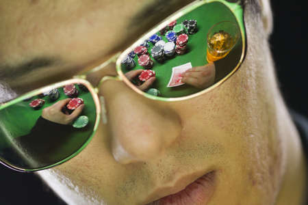 Poker player in sunglasses, horizontalの写真素材