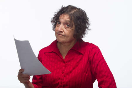 Woman reviewing business report, horizontalの写真素材