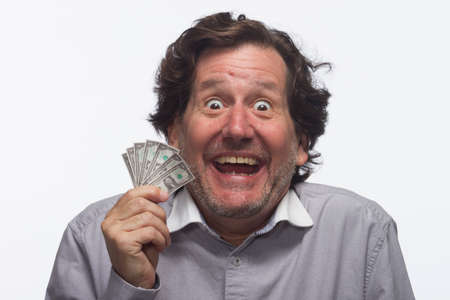 Happy man with money, horizontalの写真素材