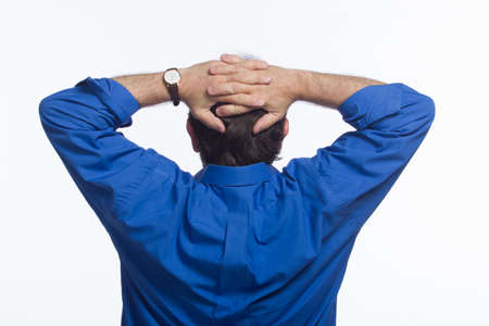 Backside of man with hands on head, horizontal
