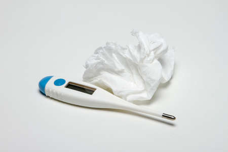 Thermometer and used tissue