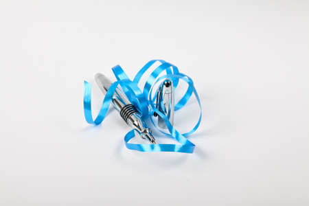 ballpoint pen with blu decoration isolated on whiteの写真素材