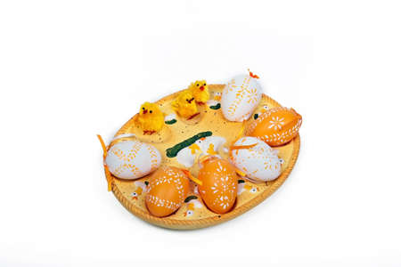 little yellow ckickens and colorful eggs celebrates easterの写真素材