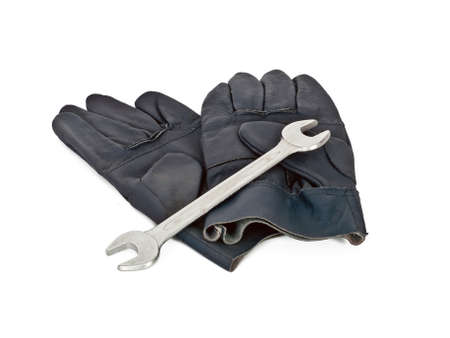 work leather gloves and wrenchの写真素材