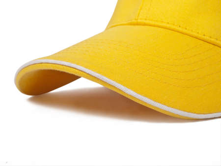 detail of yellow cap isolated on white backgroundの写真素材
