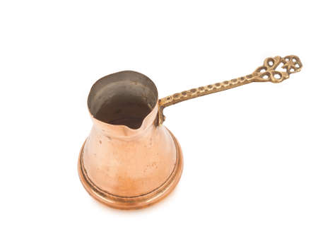 used copper coffee maker isolated on white backgroundの写真素材